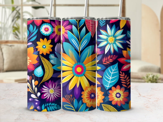 Colorful floral pattern on three tall tumblers with straws.