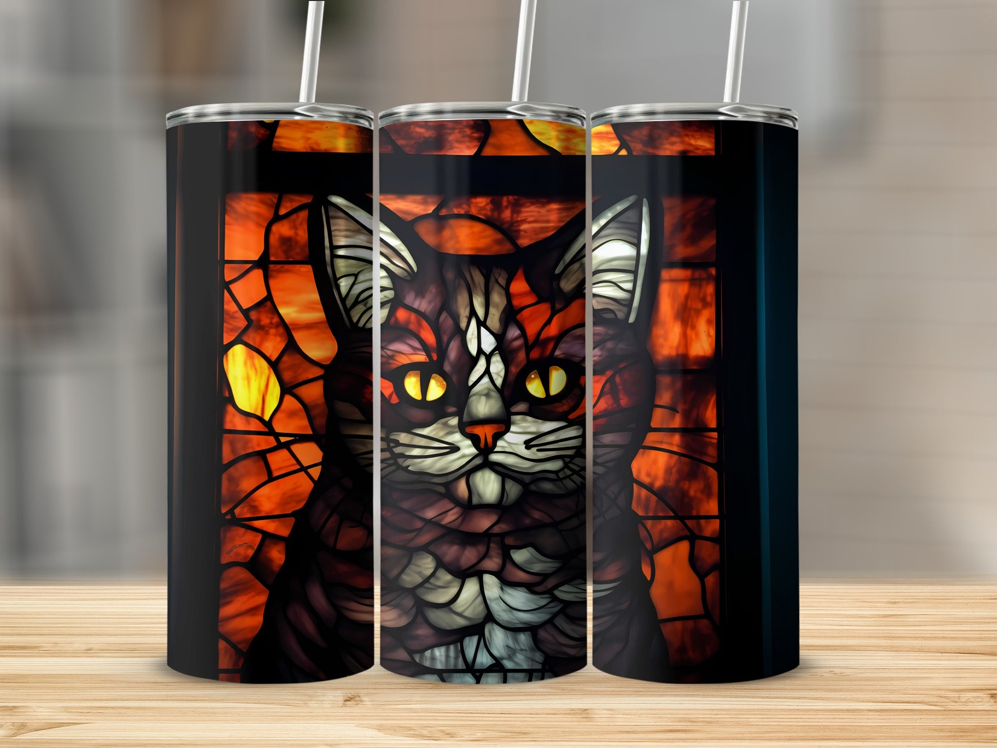 Stained glass cat art on a black tumbler with straw.