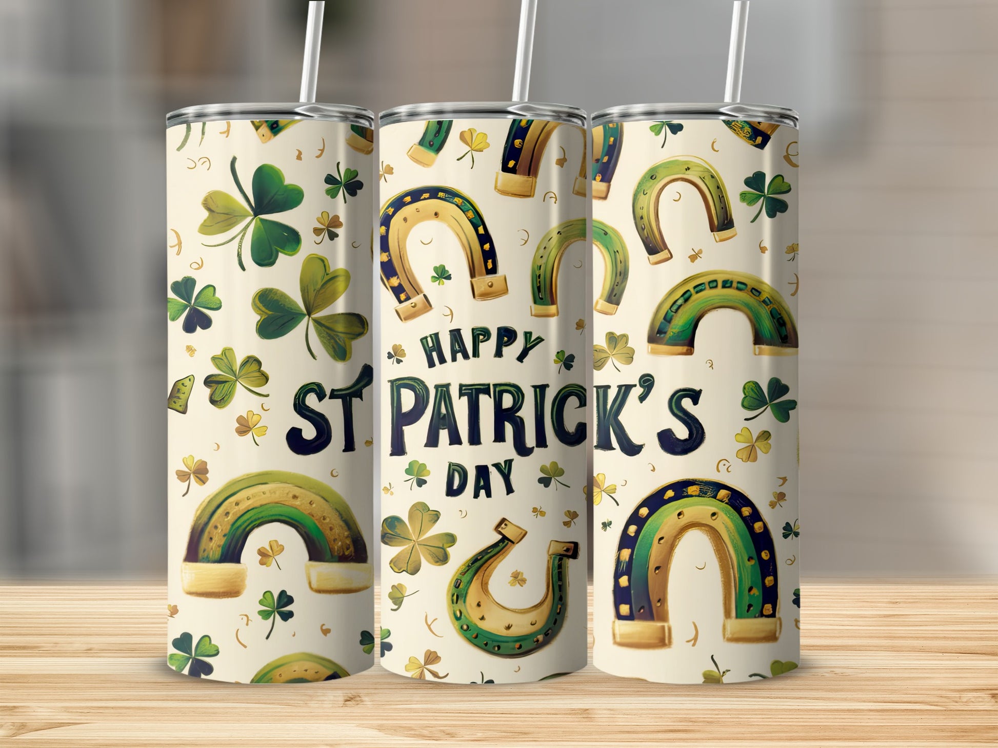 Three St. Patrick's Day tumblers with shamrocks and rainbows.