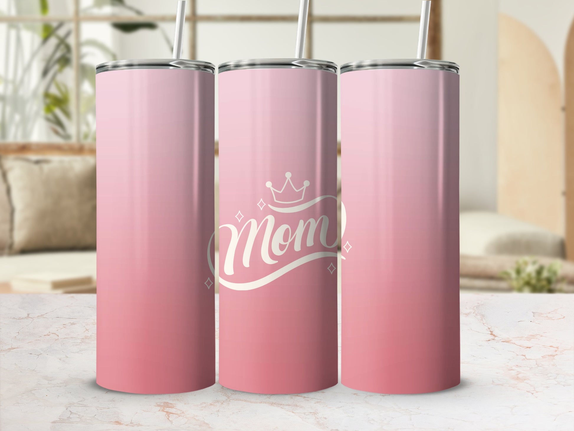 Pink ombre tumbler with "Mom" in white script and a crown.