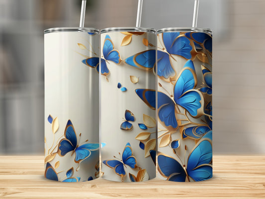 Three tall tumblers with blue butterflies and gold accents.
