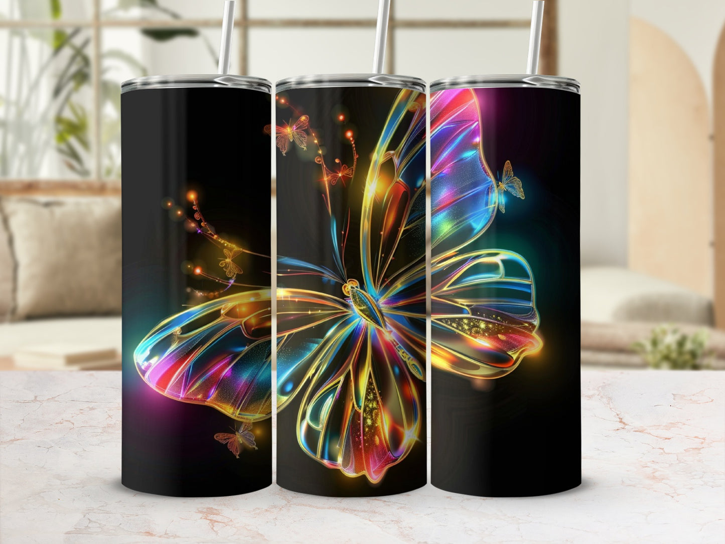 Colorful butterfly design on three black tumblers.