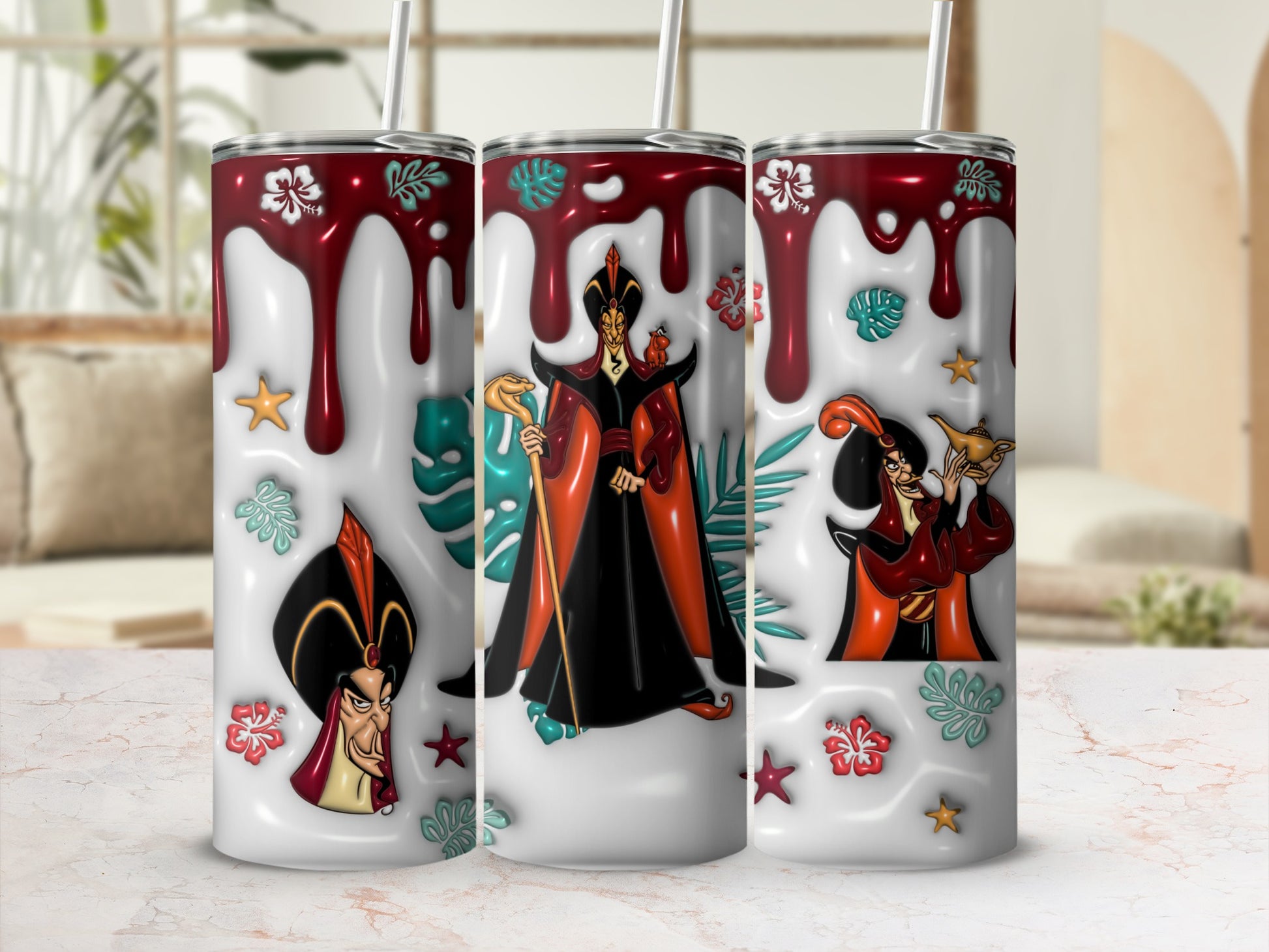 Three tumblers featuring Jafar from Aladdin, with tropical leaves and flowers.