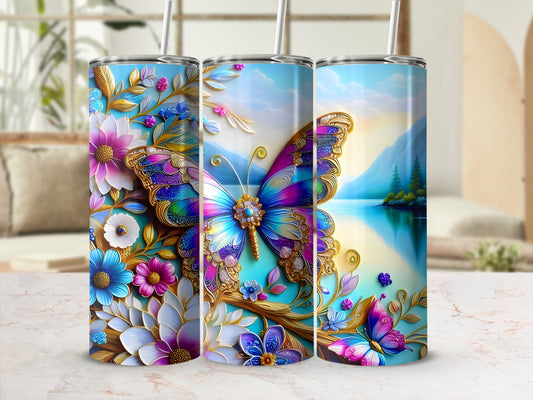 Three tumblers with floral and butterfly designs, reflecting a lake scene.