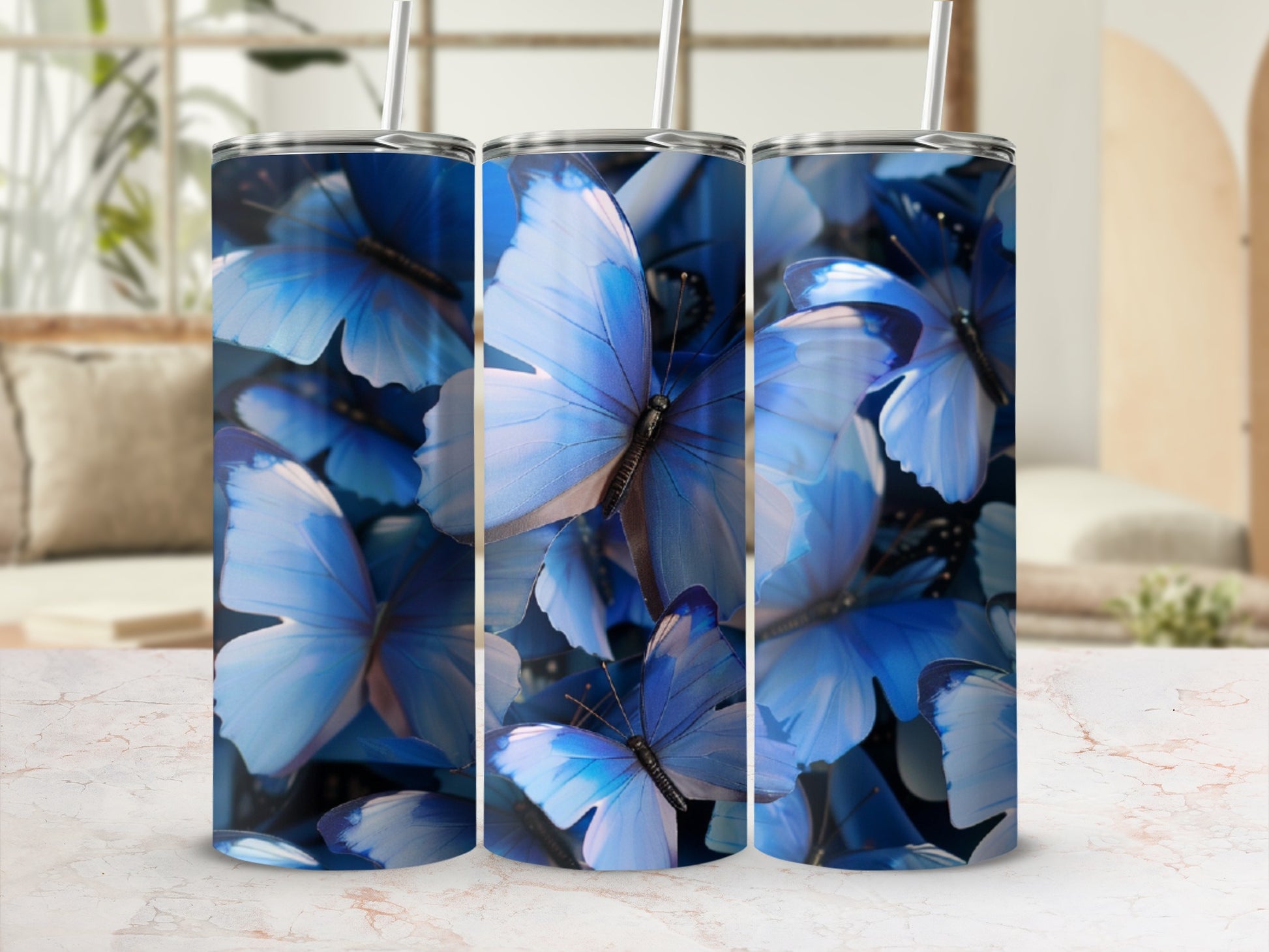 Blue butterflies cover a textured tumbler with two straws.