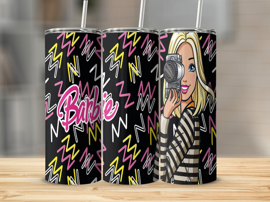 Barbie tumbler with camera graphic and zigzag pattern.