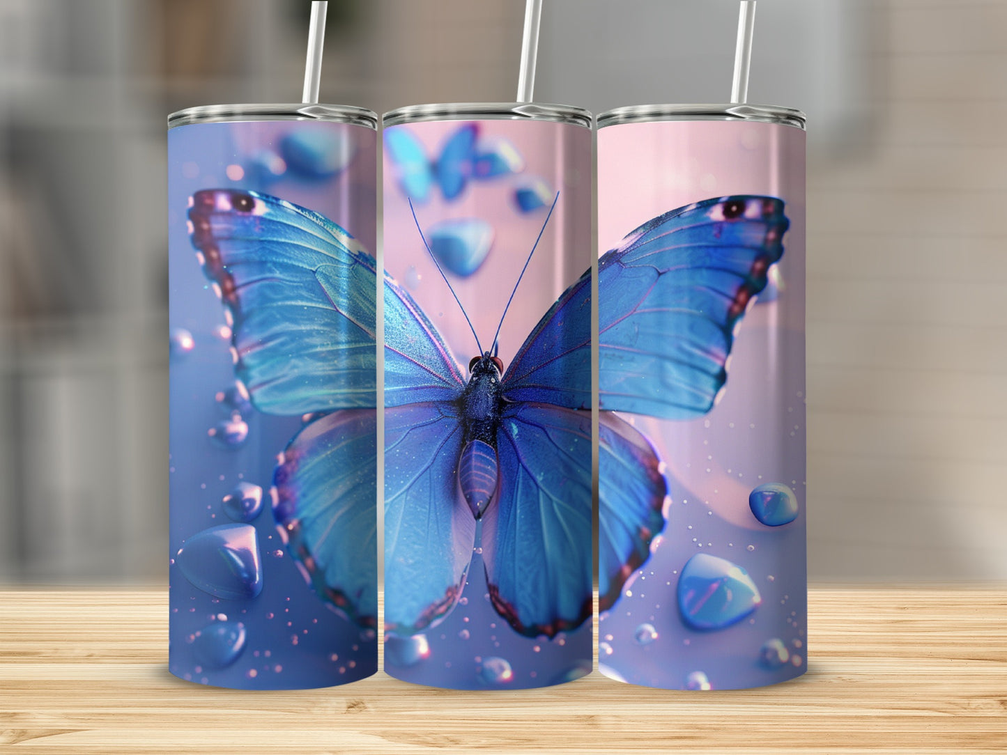 Three tumblers featuring a blue butterfly and water droplets.
