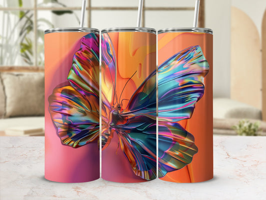 Orange tumbler with iridescent butterfly design and straw.