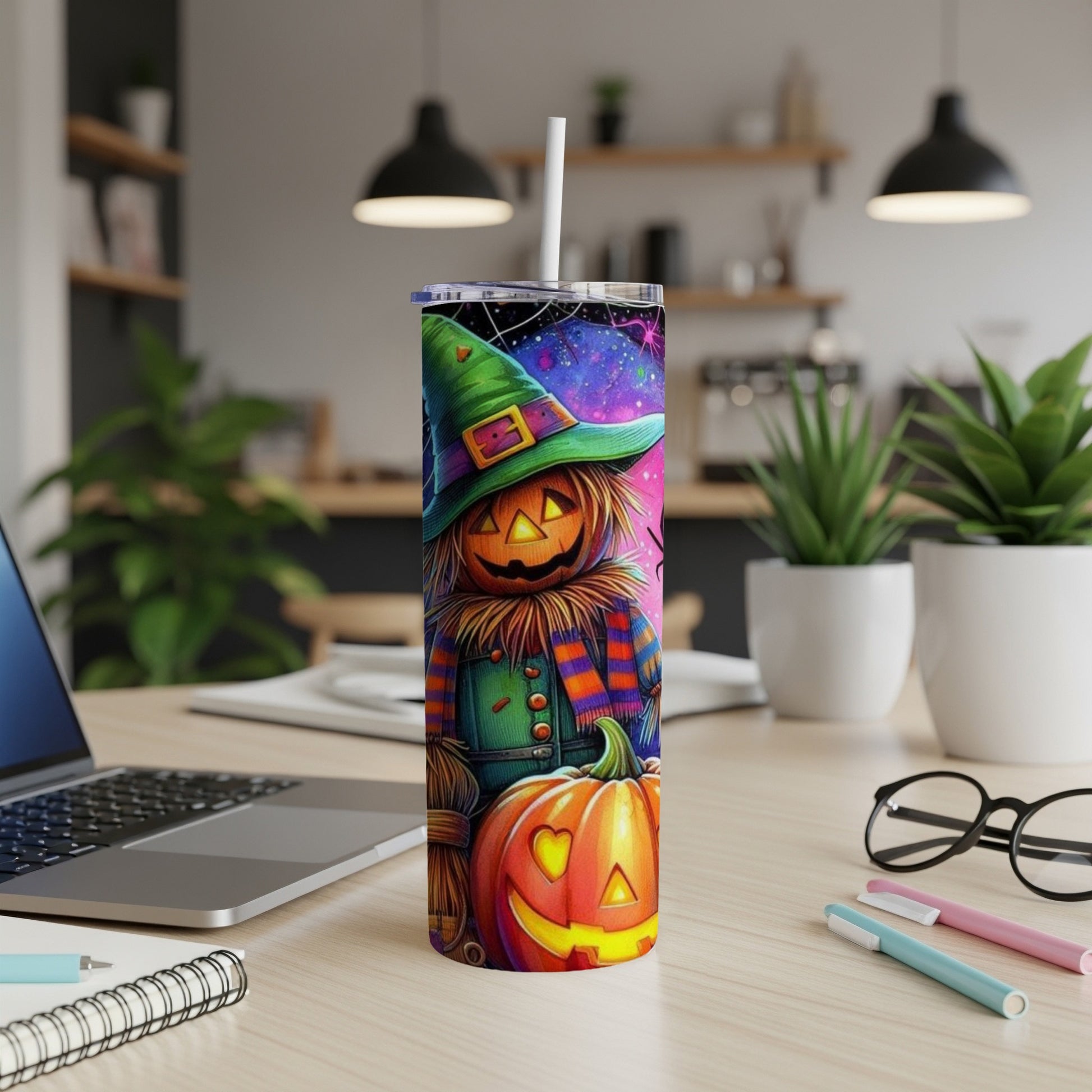 Halloween scarecrow and pumpkin tumbler with a colorful cosmic background.