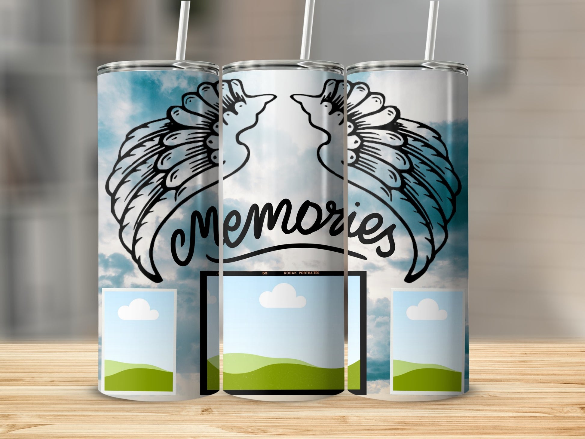 Three tumblers with angel wings and the word "Memories" design.