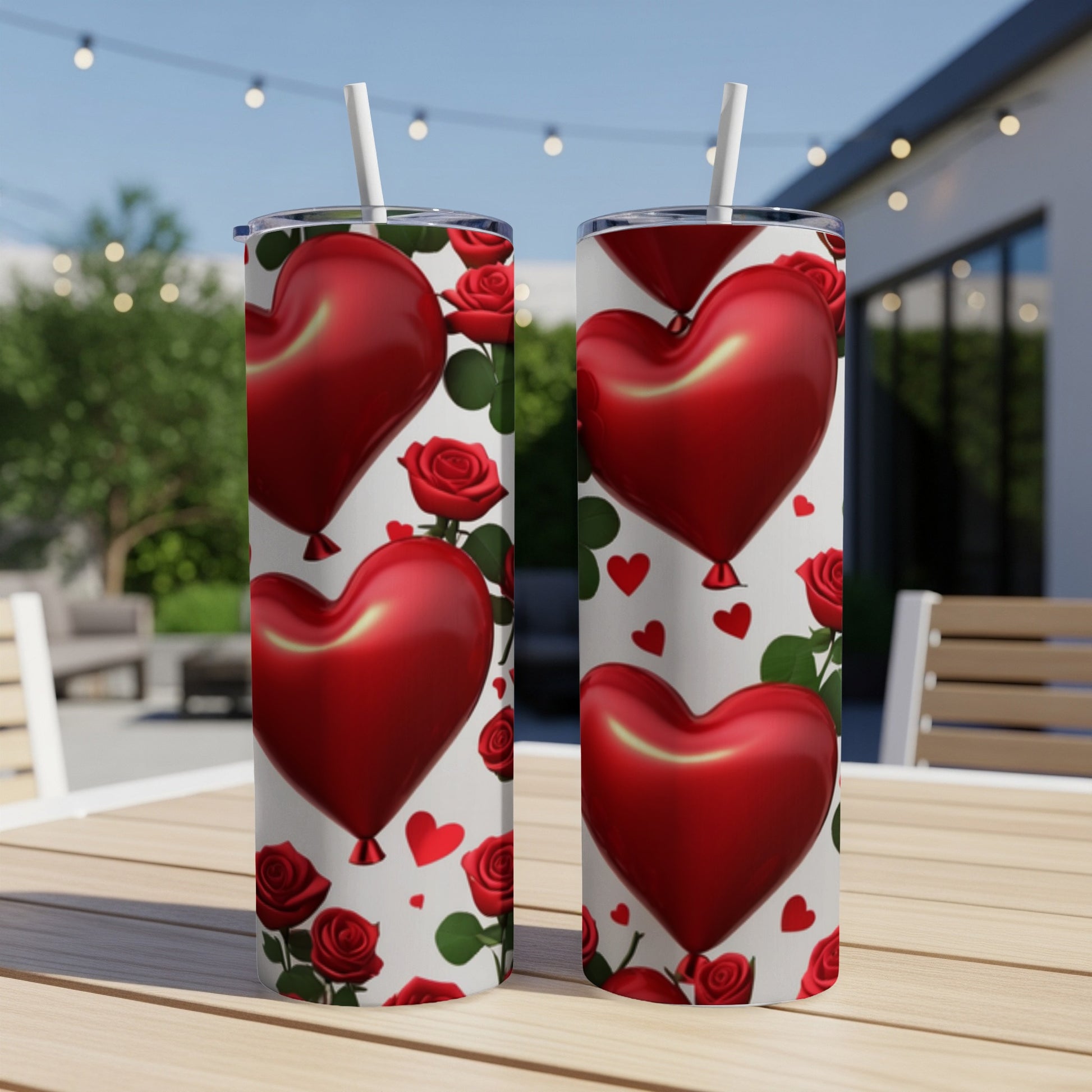 Two tumblers with a red heart and rose pattern.