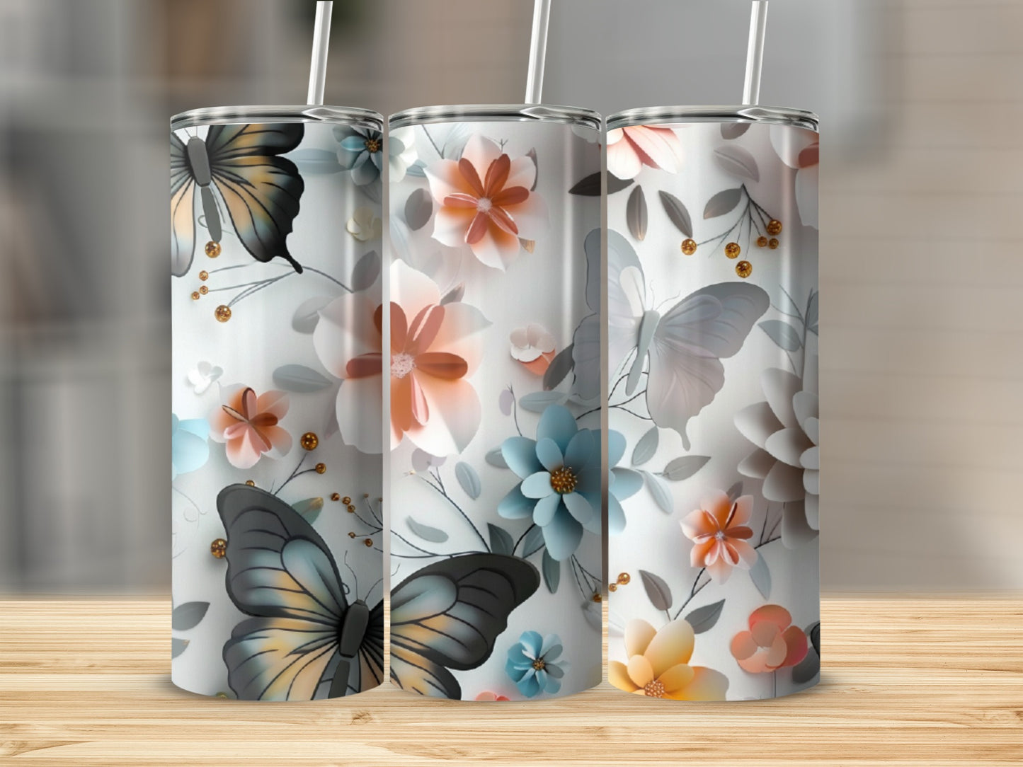 Tumbler with butterflies and floral pattern, white background.