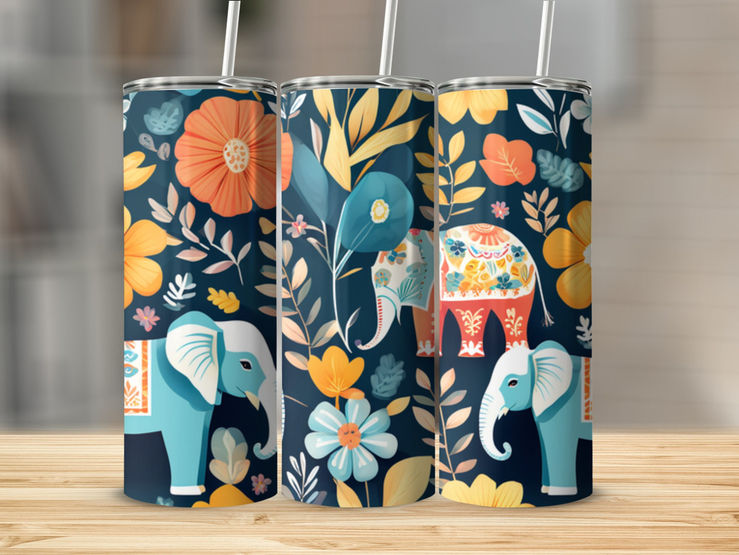 Three tumblers with colorful floral and elephant designs.