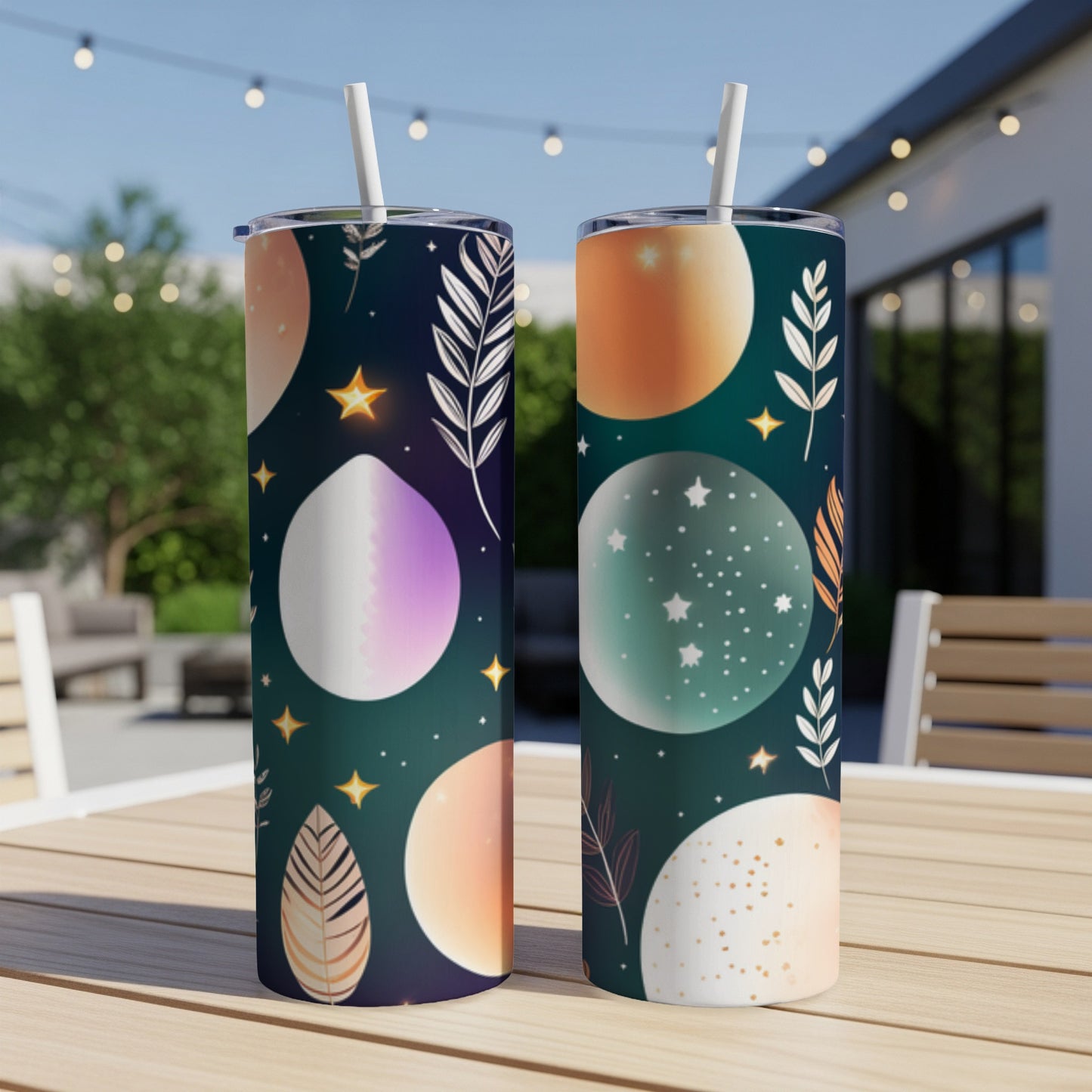 Two tall tumblers with colorful planet and celestial designs.