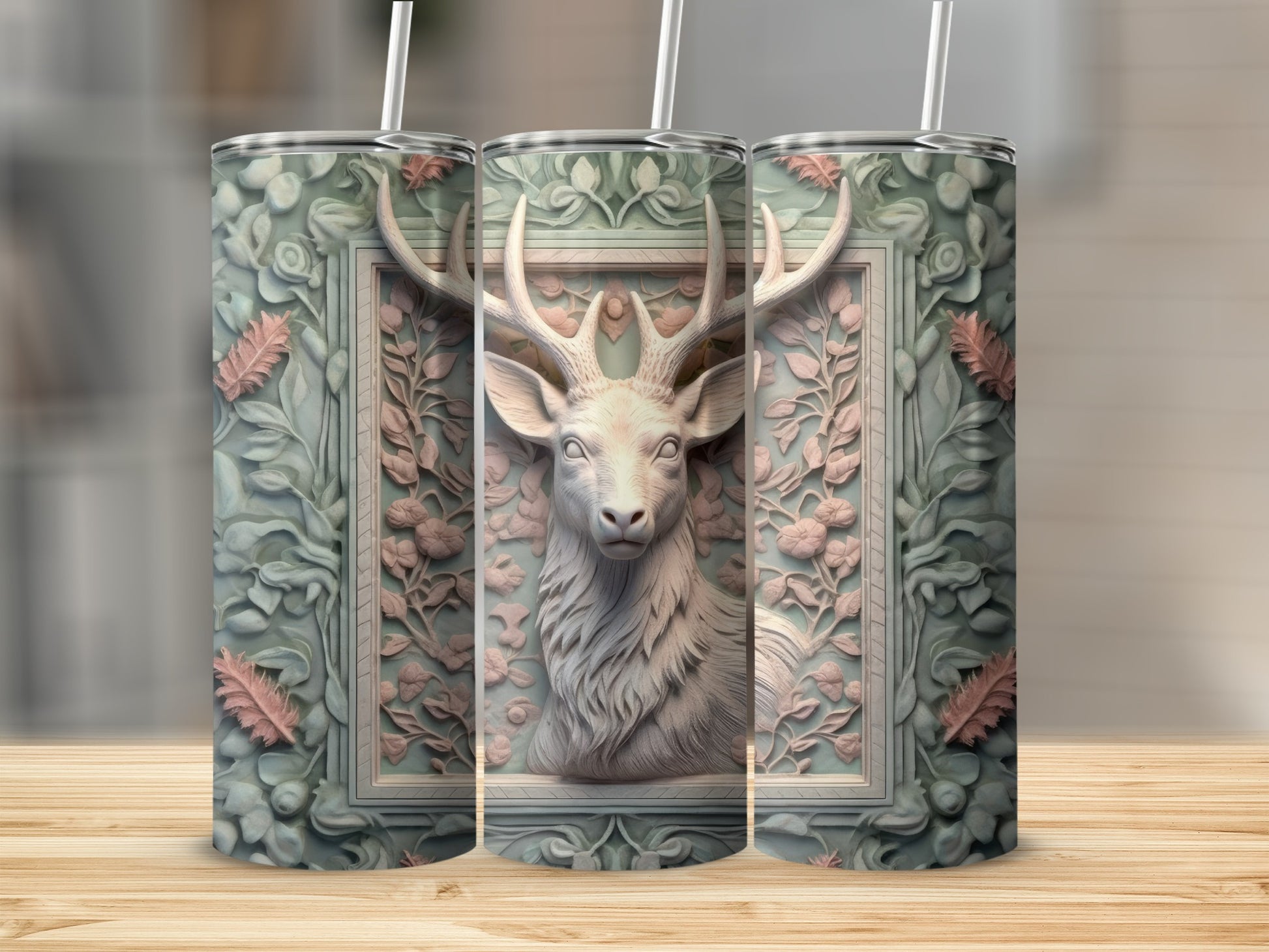 Deer head in ornate frame on a patterned tumbler.