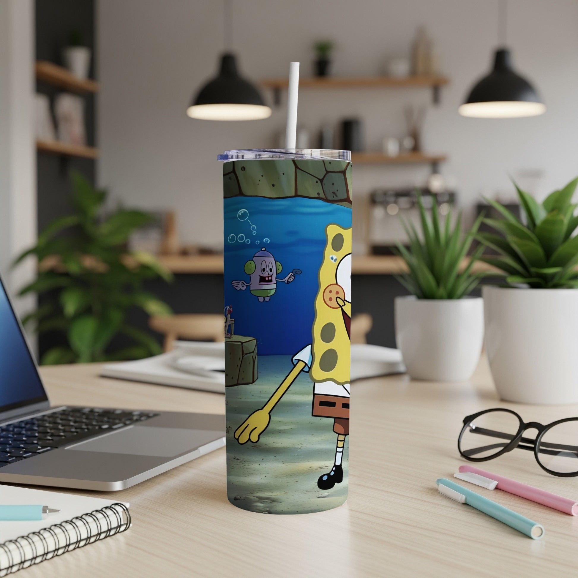 SpongeBob SquarePants character on a tumbler with a water and coral background.