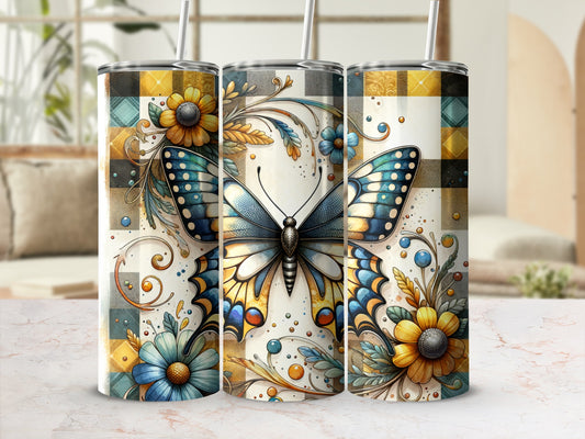 Tapestry butterfly and floral design on a set of three tumblers.