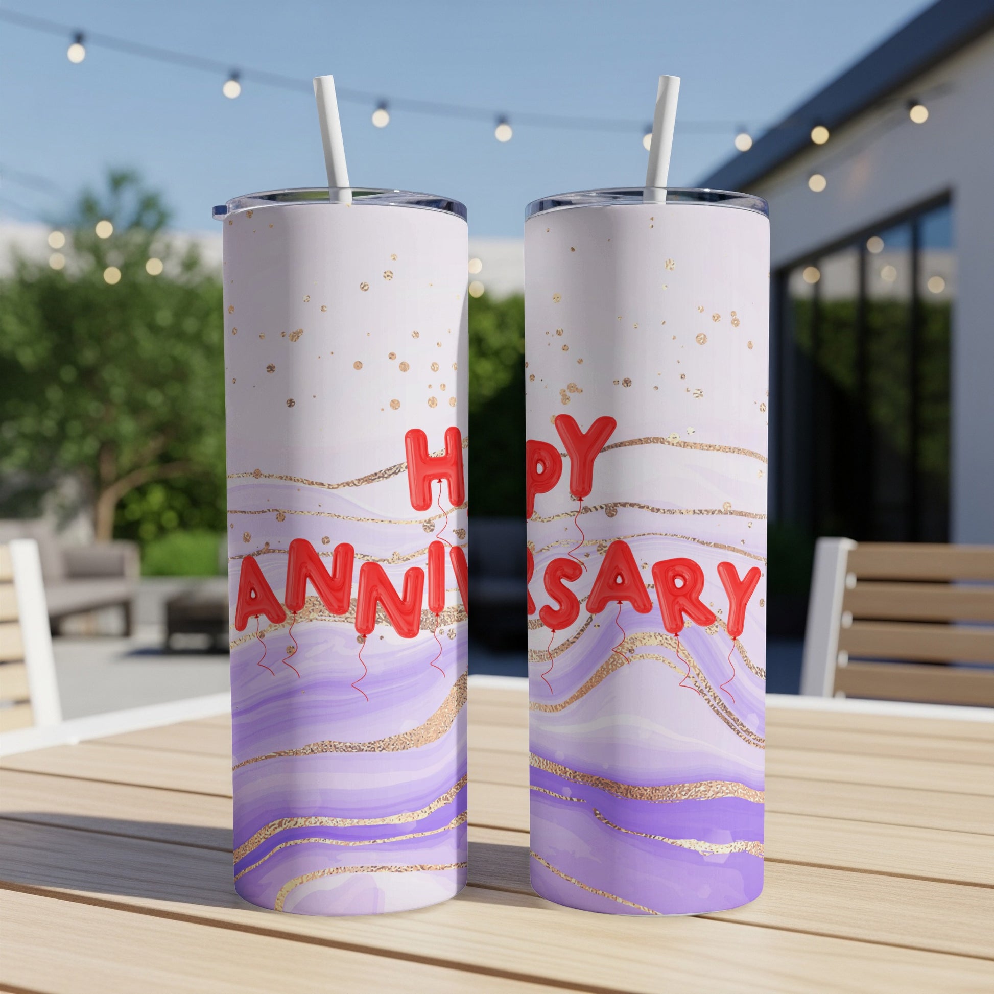 Two tumblers with "Happy Anniversary" text and purple and gold swirls.