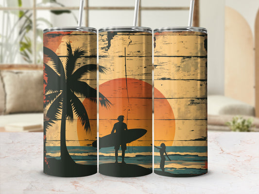 Beach scene with palm tree and surfers on a tumbler.