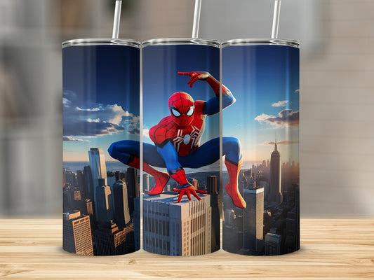 Spiderman in a city skyline on a tumbler with two straws.