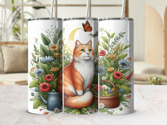 Orange tabby cat with flowers and crescent moon design on a skinny tumbler.