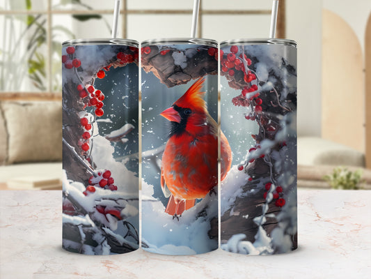 Red cardinal perched on snow-covered branch with red berries.