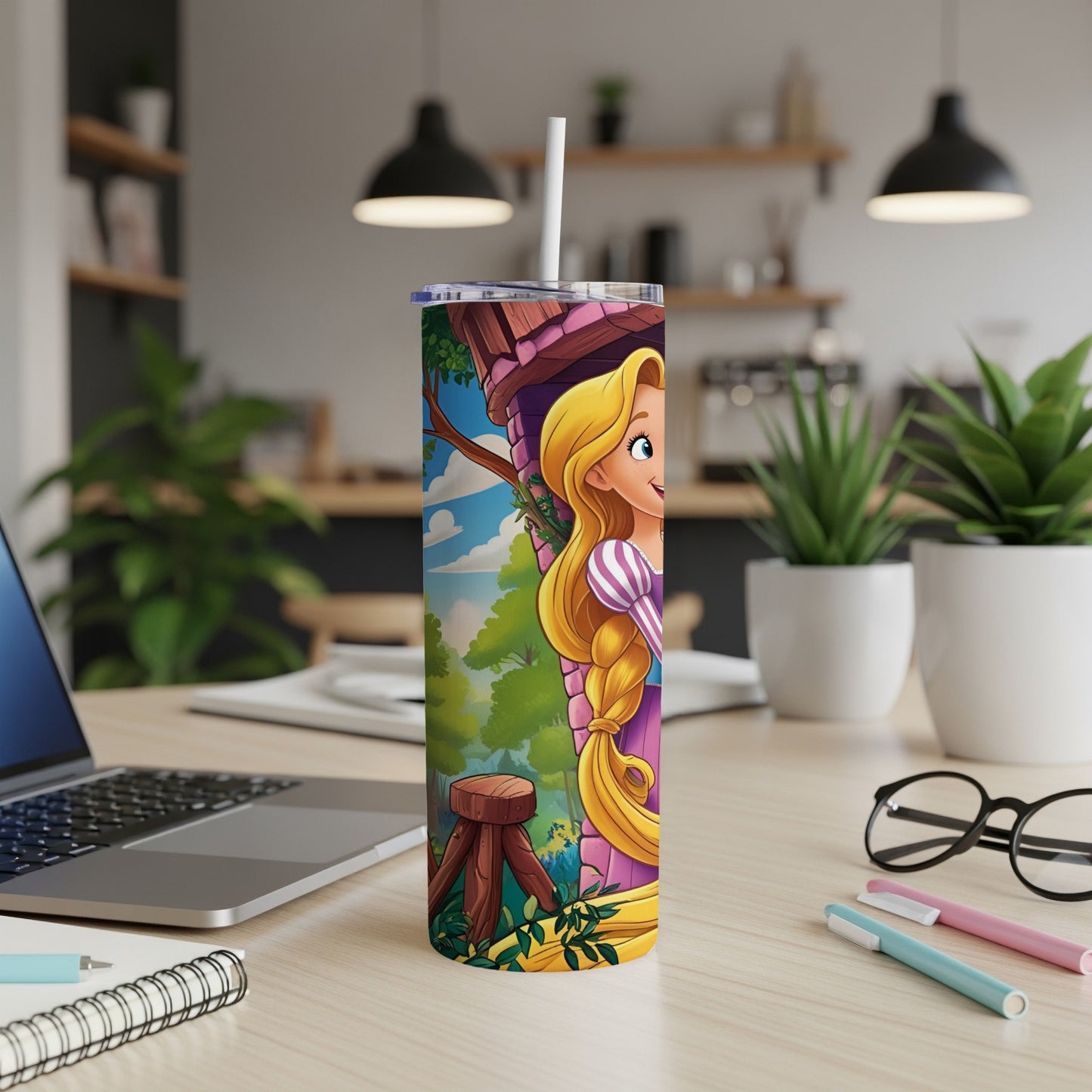 Rapunzel from Tangled on a tumbler with a straw, laptop in background.