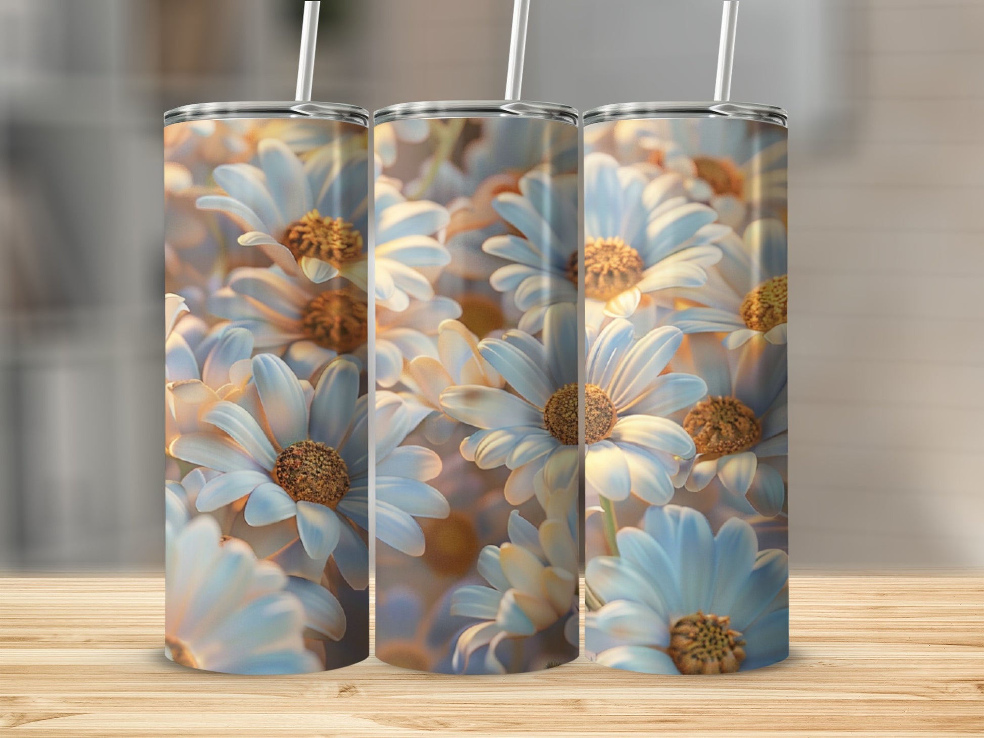 Three tumblers with a close-up daisy floral pattern on a wooden surface.