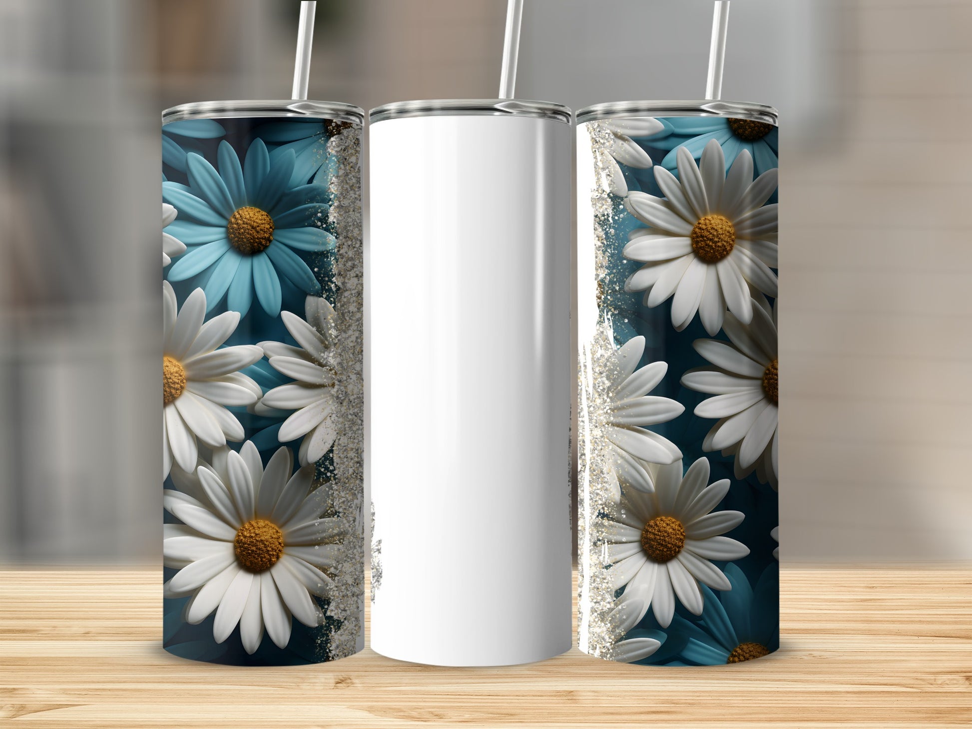White tumbler with white and blue daisies and glitter on a wooden surface.