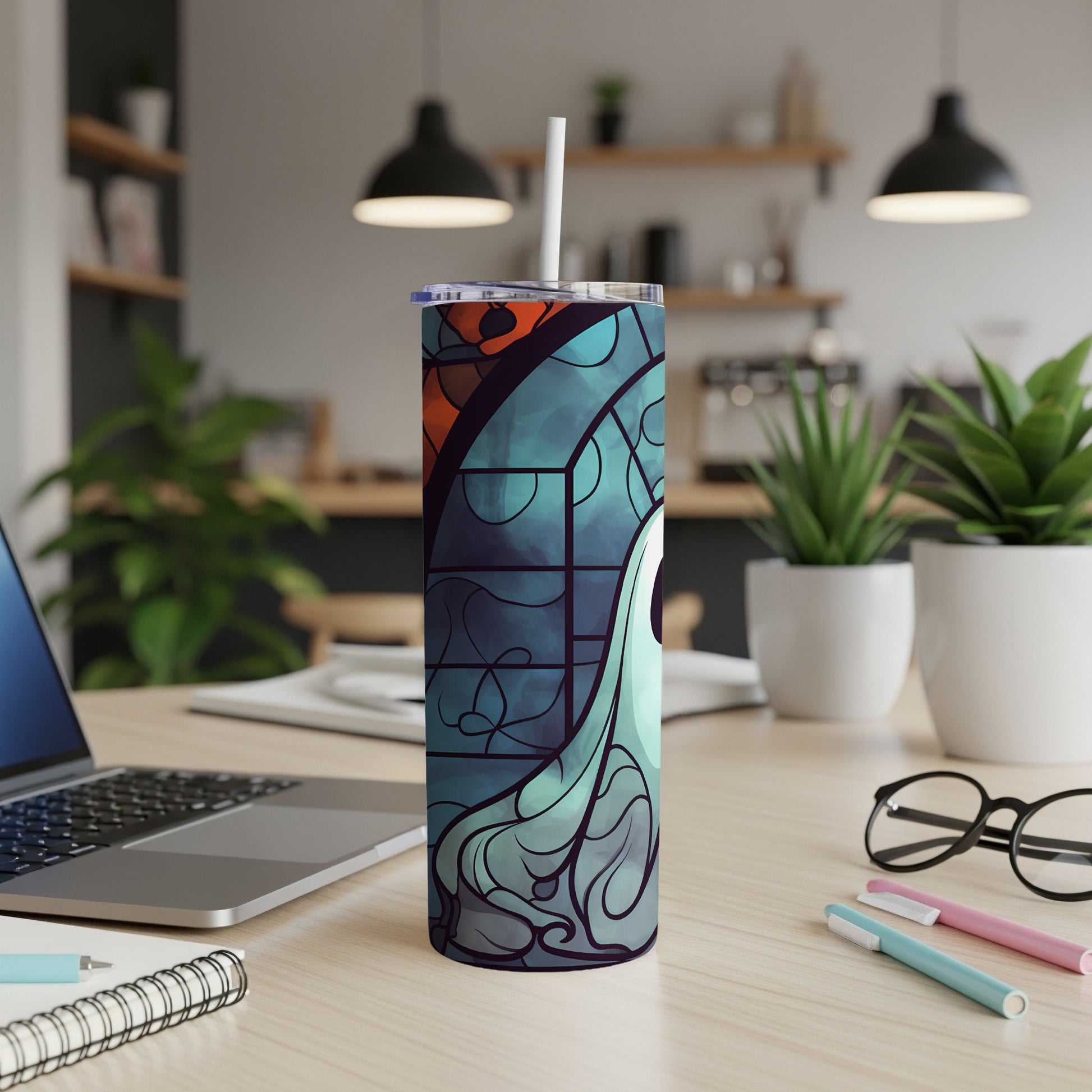 Tall tumbler with a colorful abstract stained-glass design.