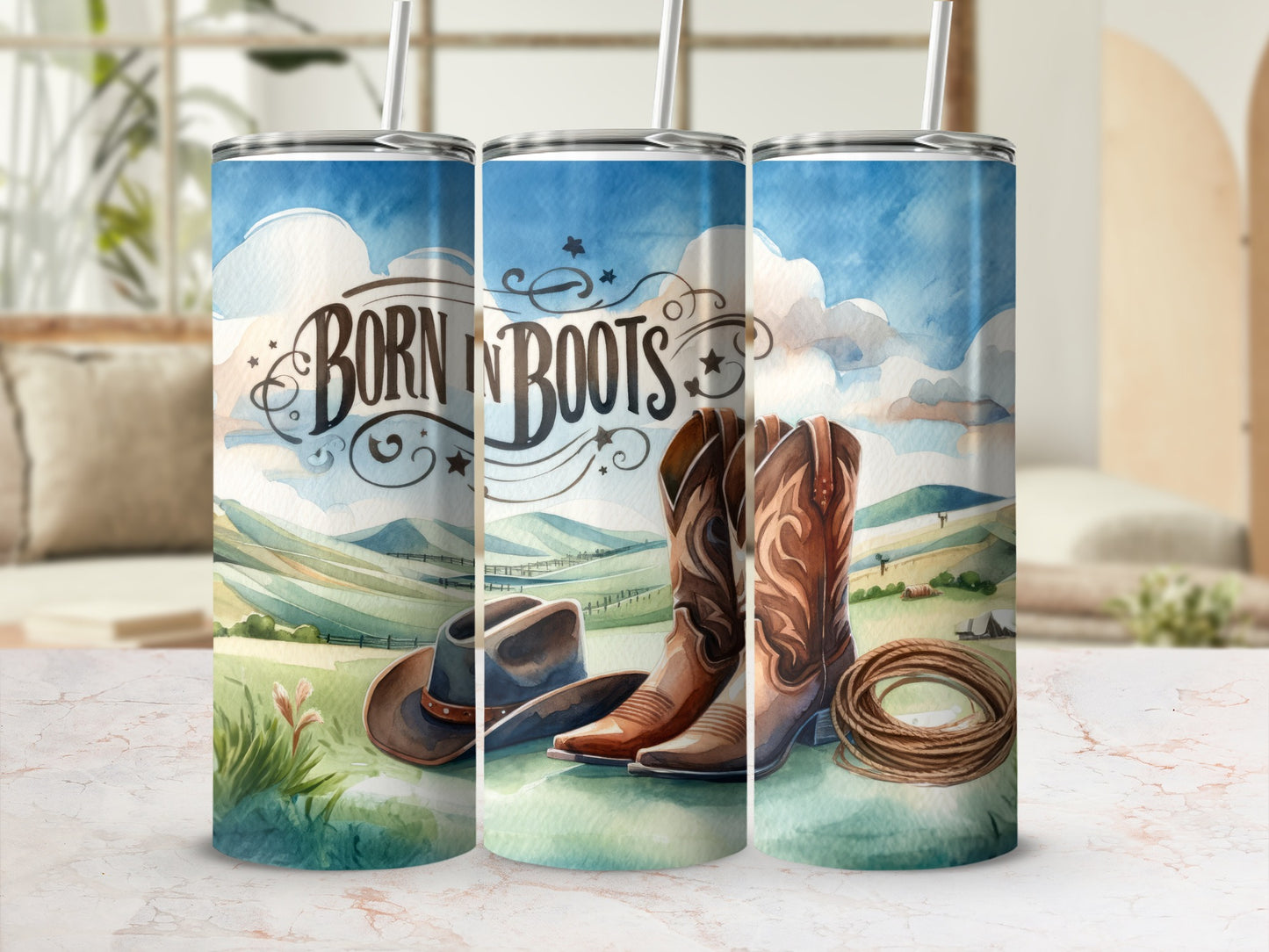 Three tumblers featuring a cowboy hat, boots, and rope with "Born in Boots" text.