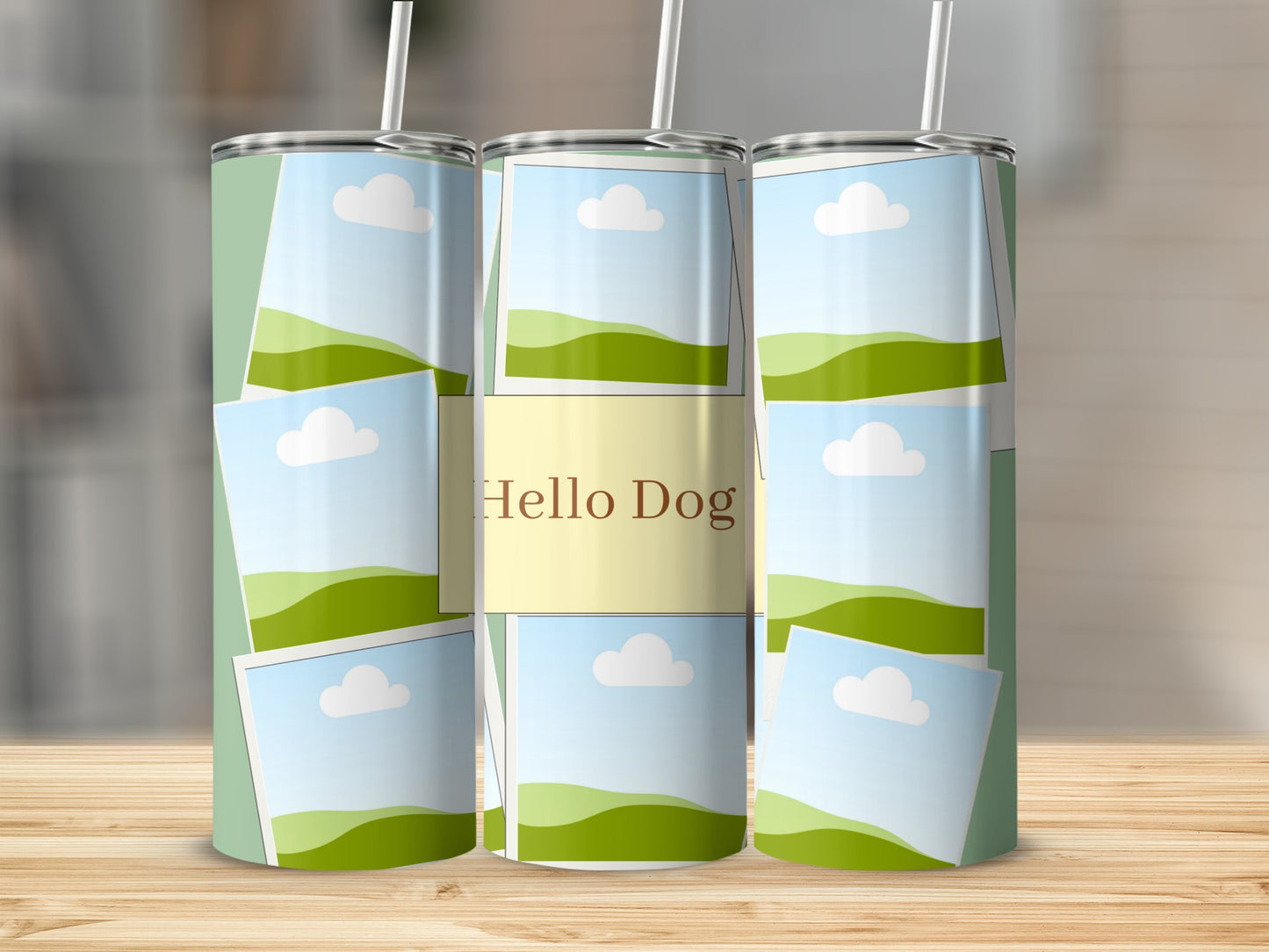 Tumbler with scattered photo frames, green hills, sky, clouds, and text "Hello Dog."