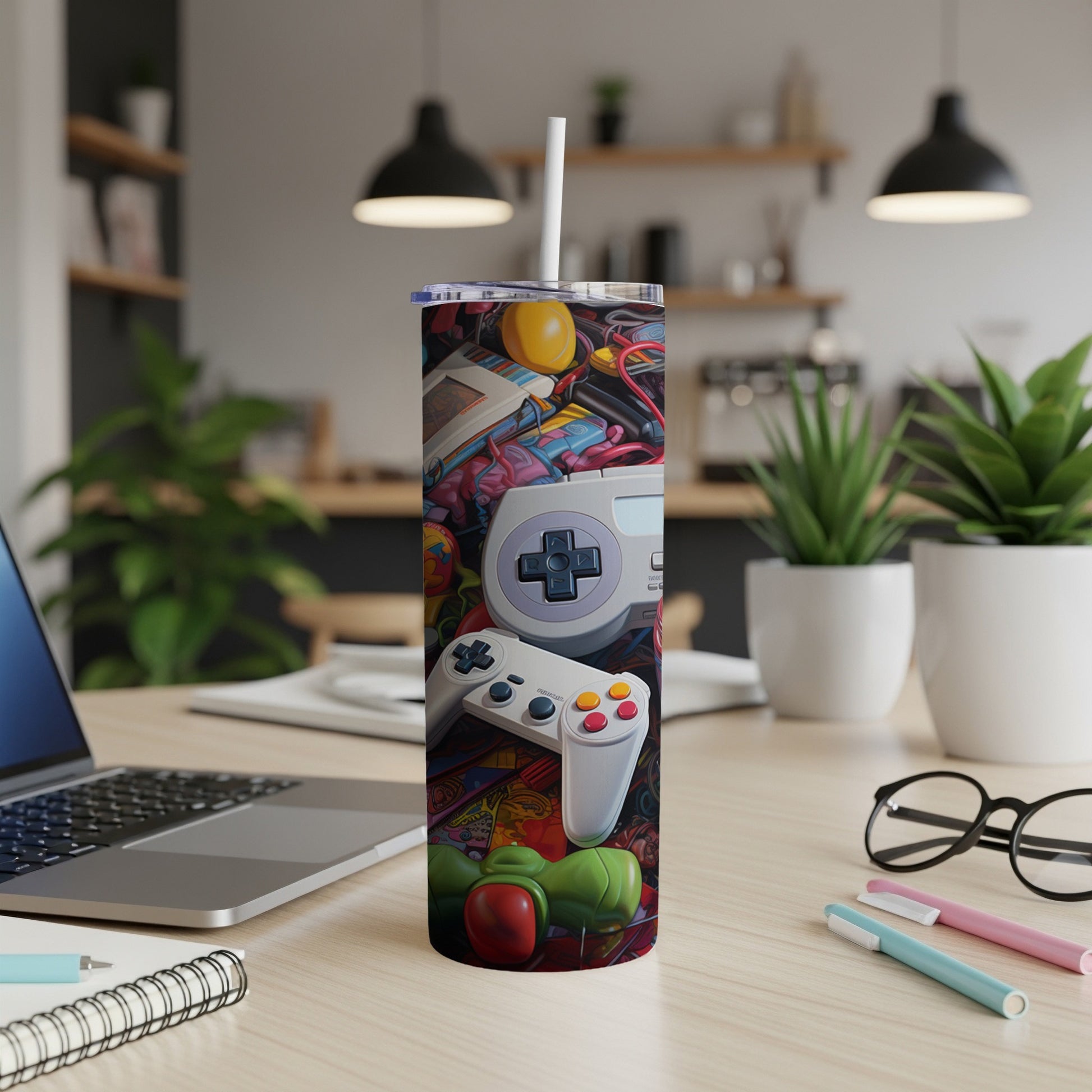 Tumbler with vintage video game controllers and cartridges.