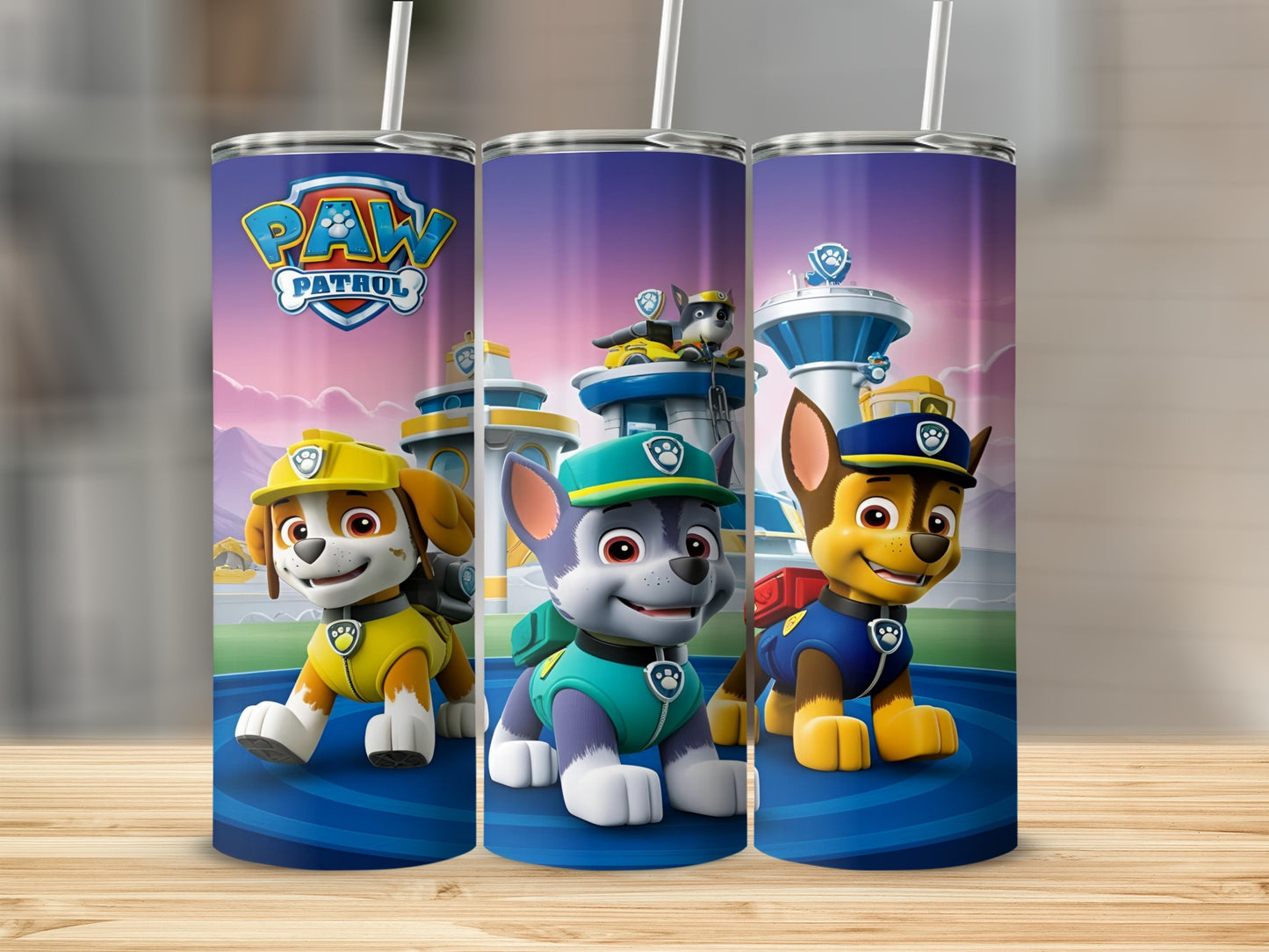 Paw Patrol pups Chase, Marshall, and Rubble on a colorful tumbler.