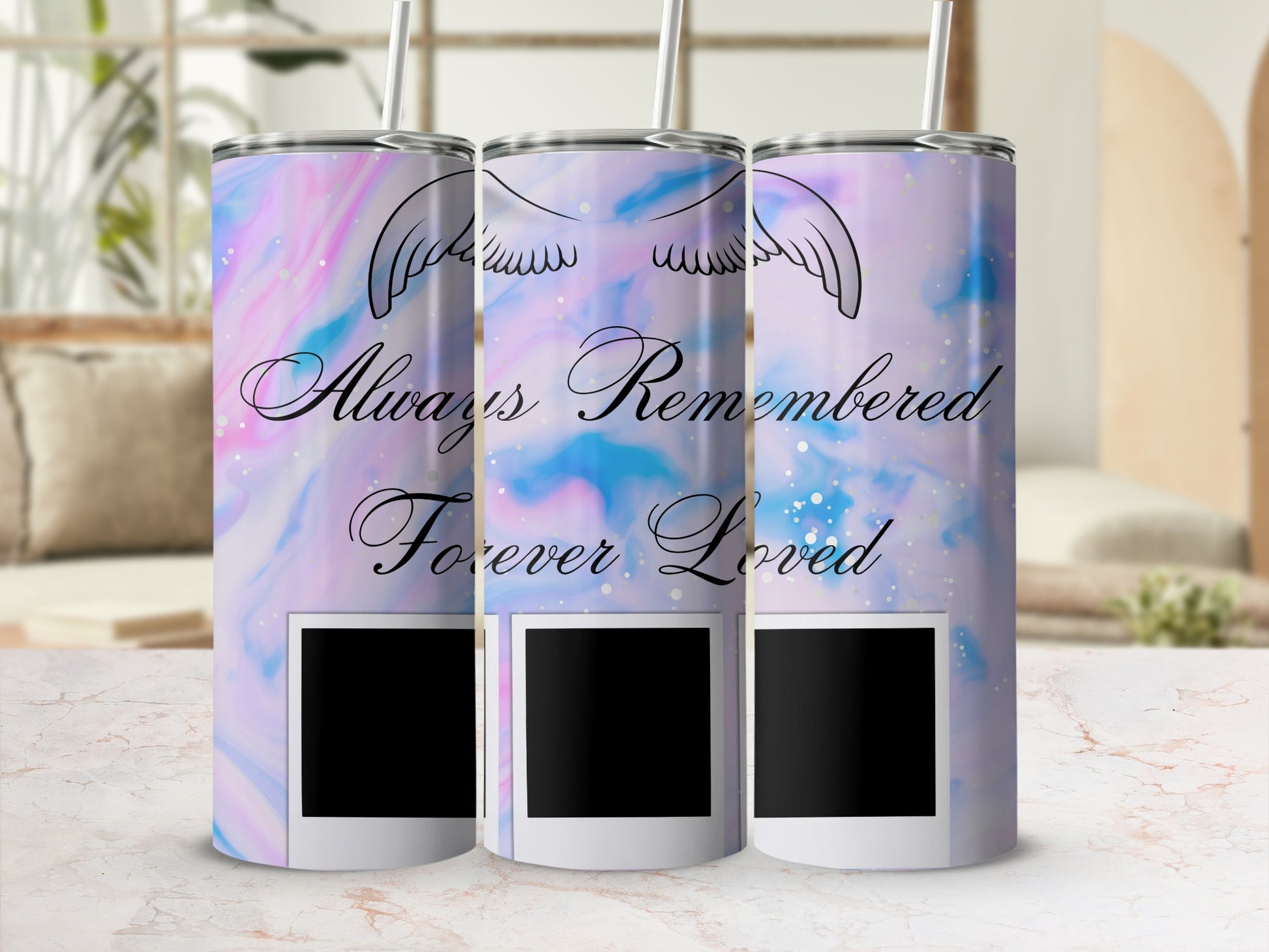 Tumblers with angel wings, "Always Remembered Forever Loved" text, and photo frames.