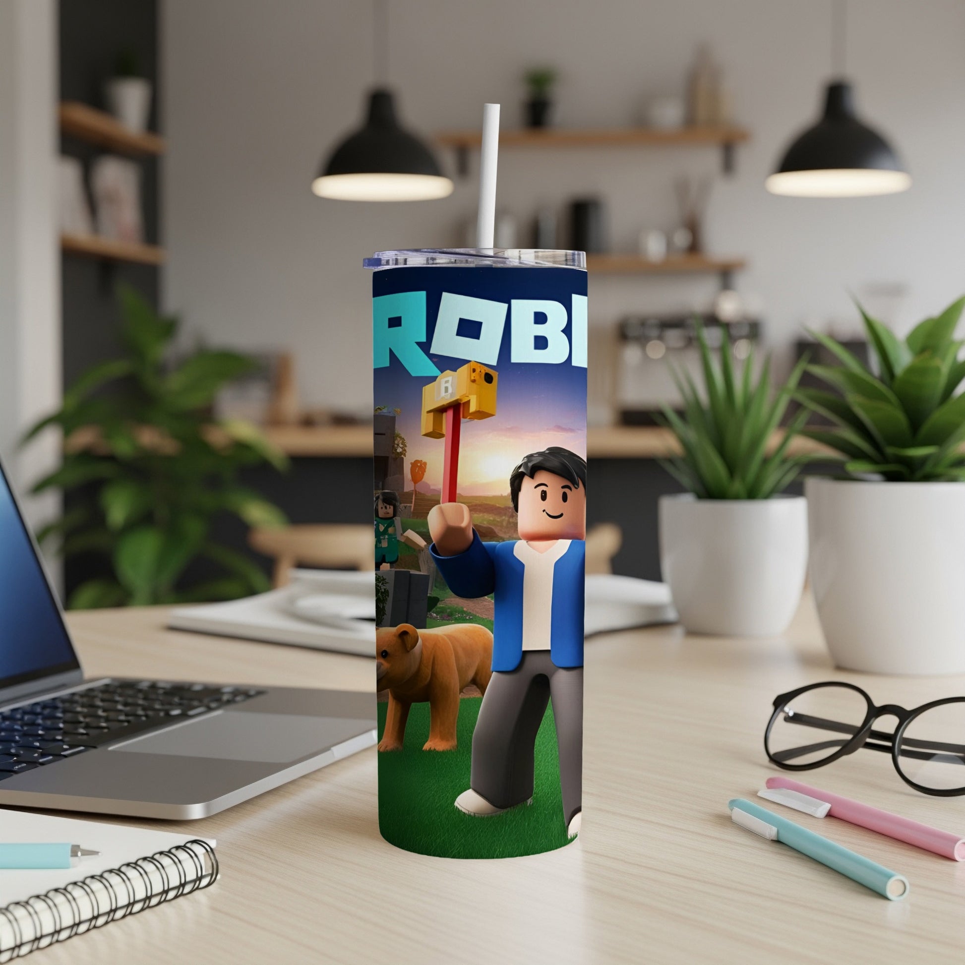 Roblox tumbler with characters and game elements on a desk.