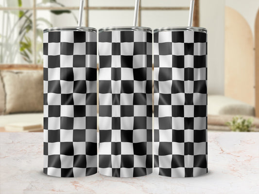 Three tumblers with black and white checkered pattern, standing on a marbled surface.