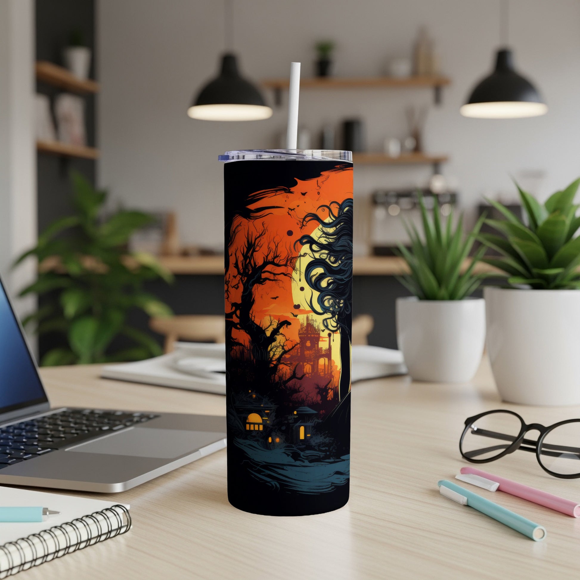 Tumbler with a spooky Halloween-themed forest and castle scene.