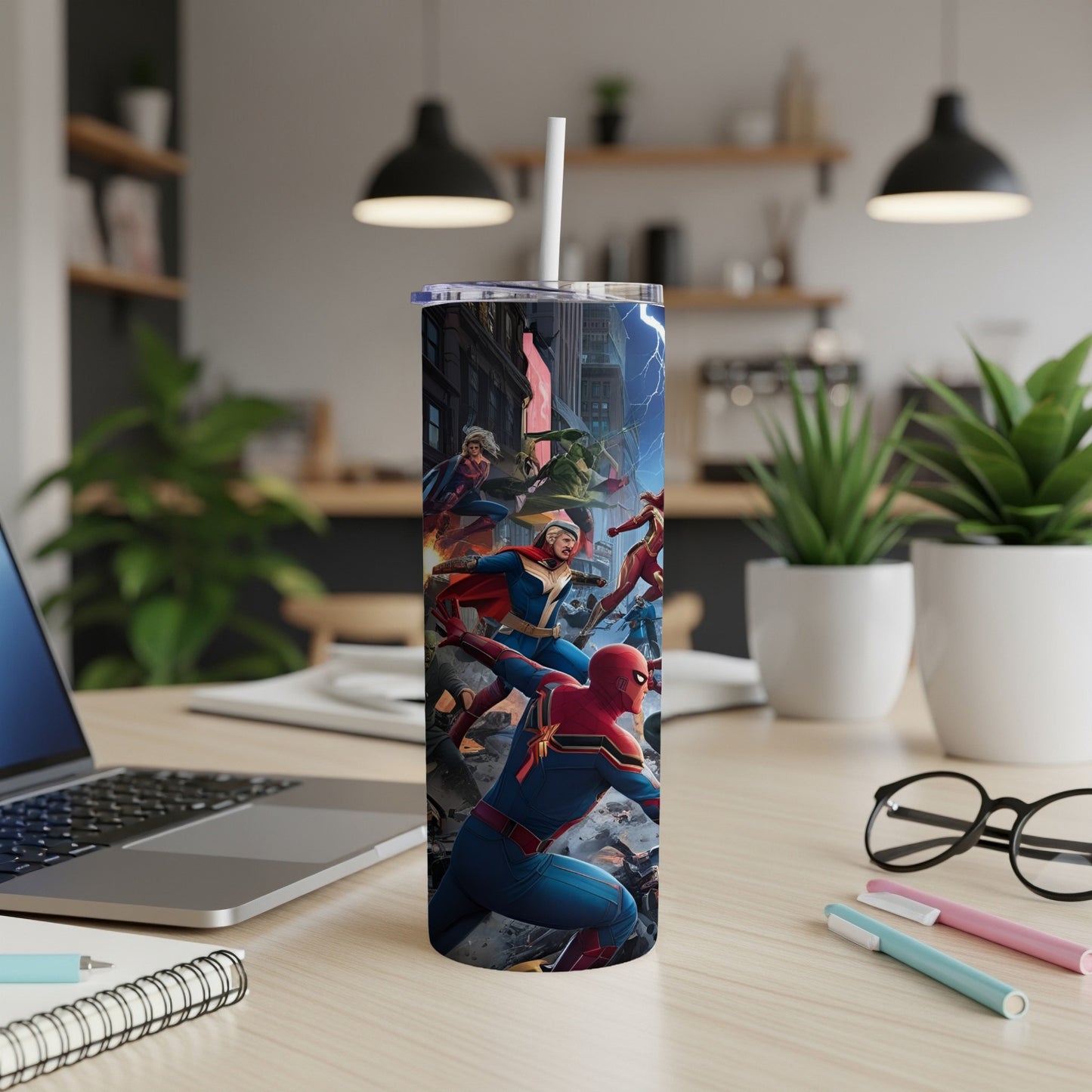 Superhero art on a skinny tumbler with a straw.
