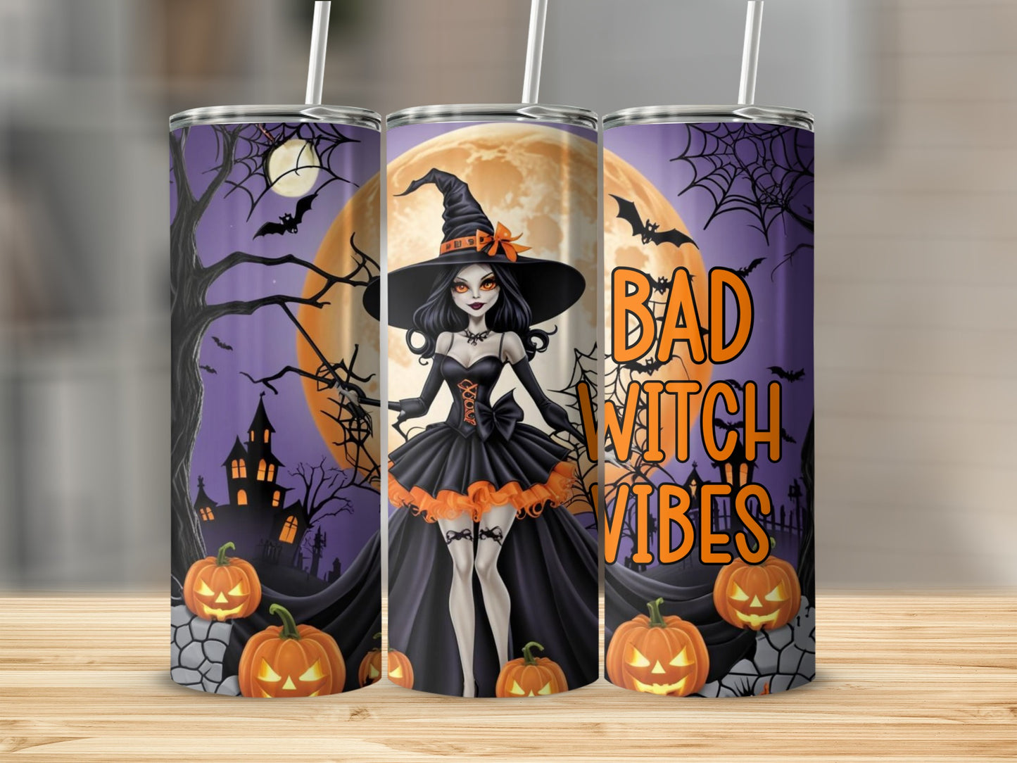 Halloween tumbler with witch, pumpkins, haunted house, bats, and "Bad Witch Vibes" text.