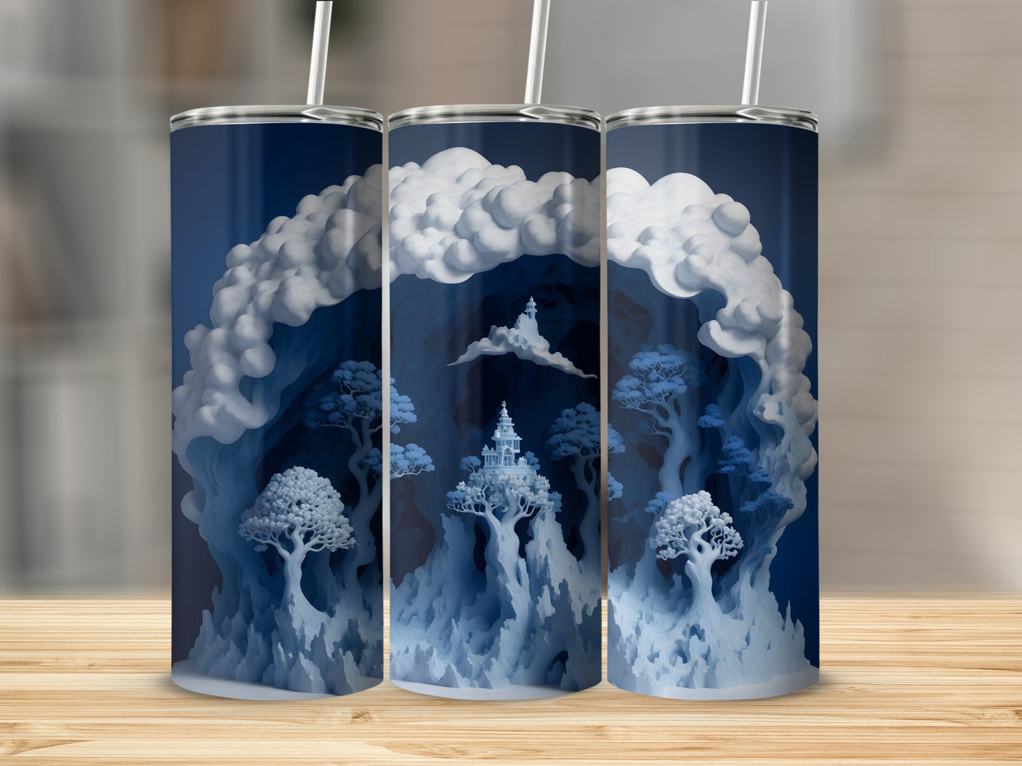 Three tumblers with fantasy mountain landscape and castle art.