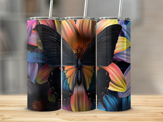 Tumbler with a large black and orange butterfly on a floral background.