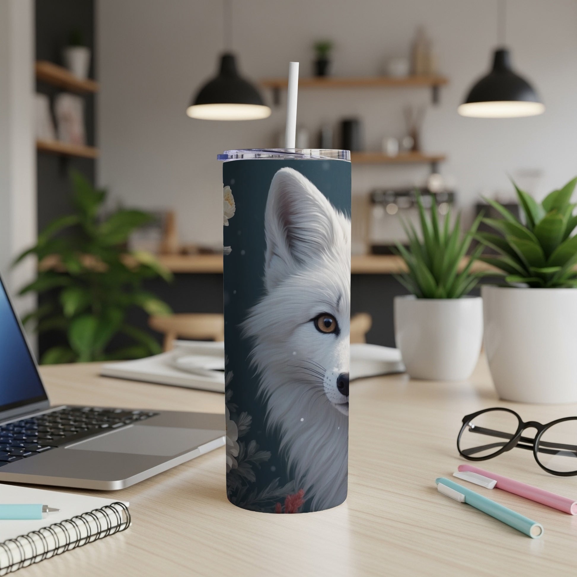 White fox illustration on a white tumbler with lid and straw.