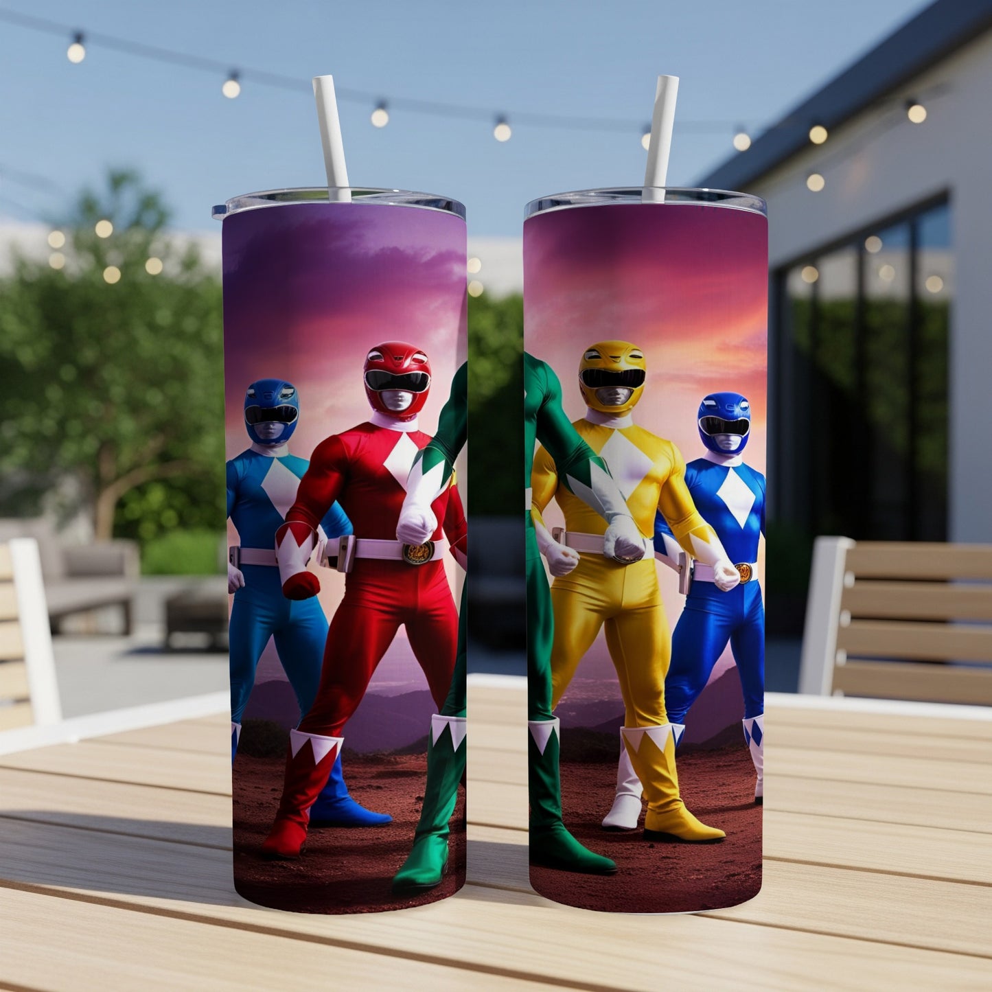 Two Power Rangers action figures stand on a table outdoors.