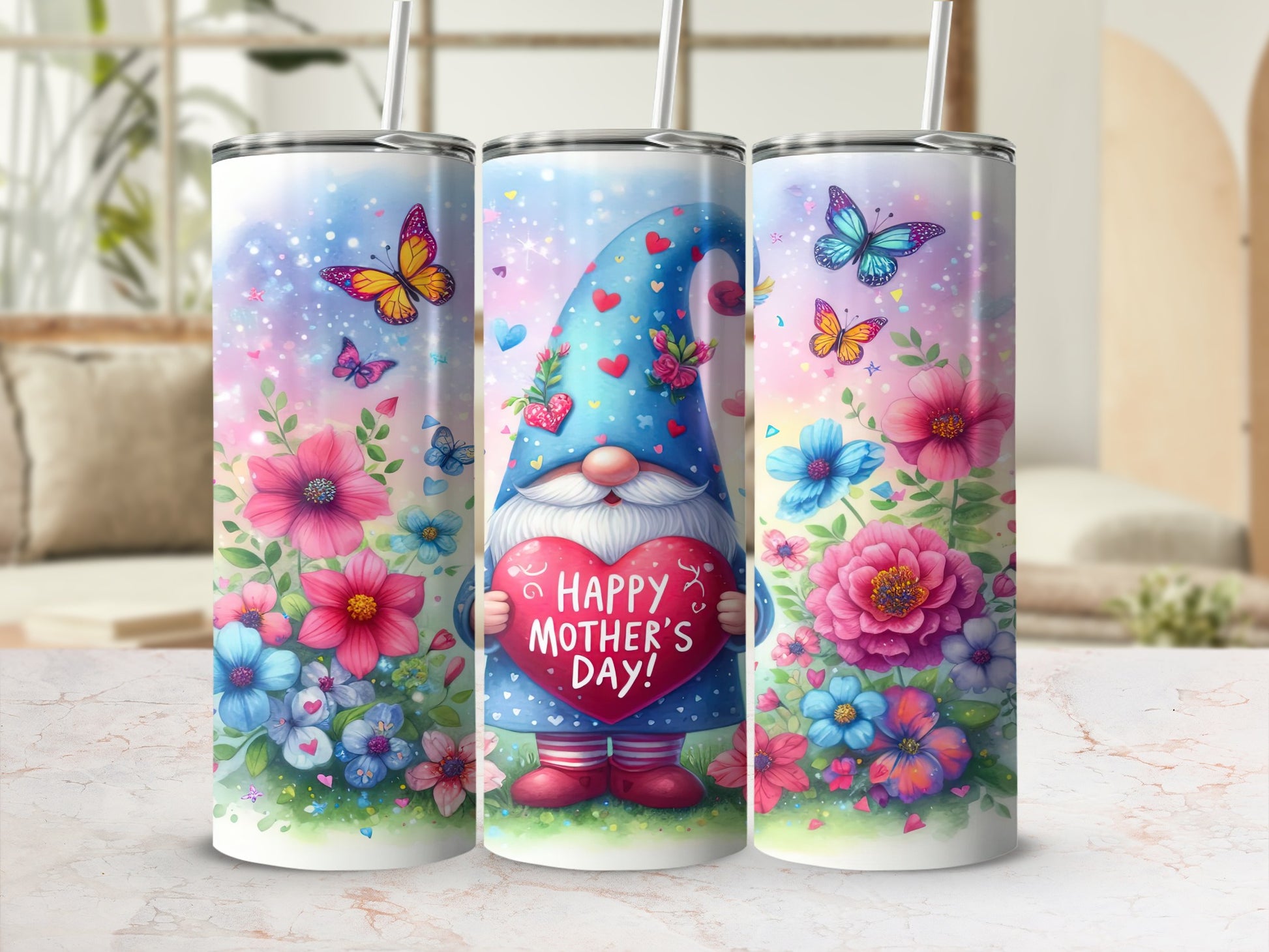 Three tumblers featuring a gnome holding a heart that says "Happy Mother's Day" surrounded by flowers and butterflies.