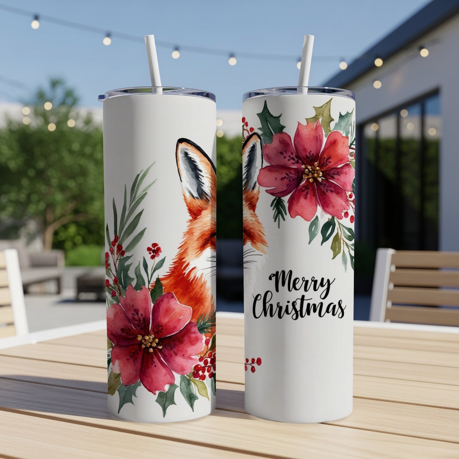 Two tumblers with fox and floral Christmas design, one says "Merry Christmas".