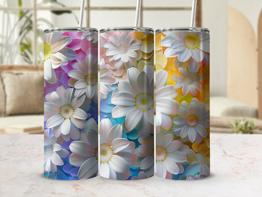 Three tumblers featuring a floral pattern of white and pastel daisies.