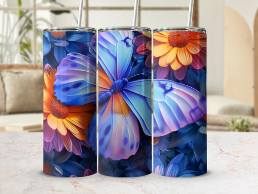 Blue butterfly and floral pattern on a tumbler with straw.