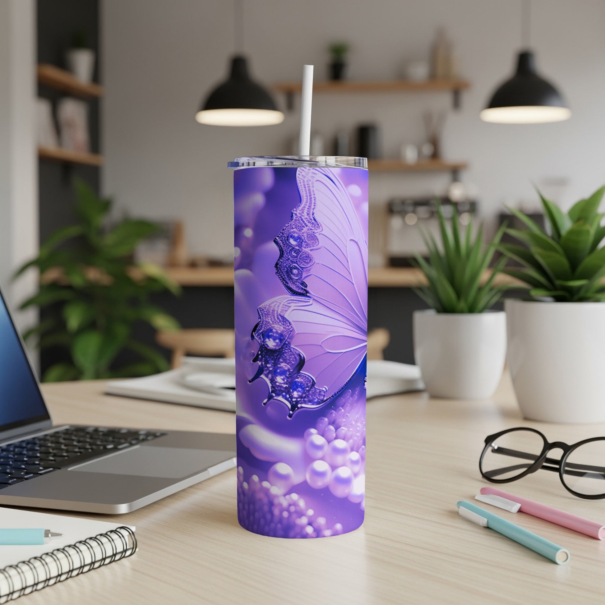 Purple butterfly tumbler with pearls and small decorative elements.