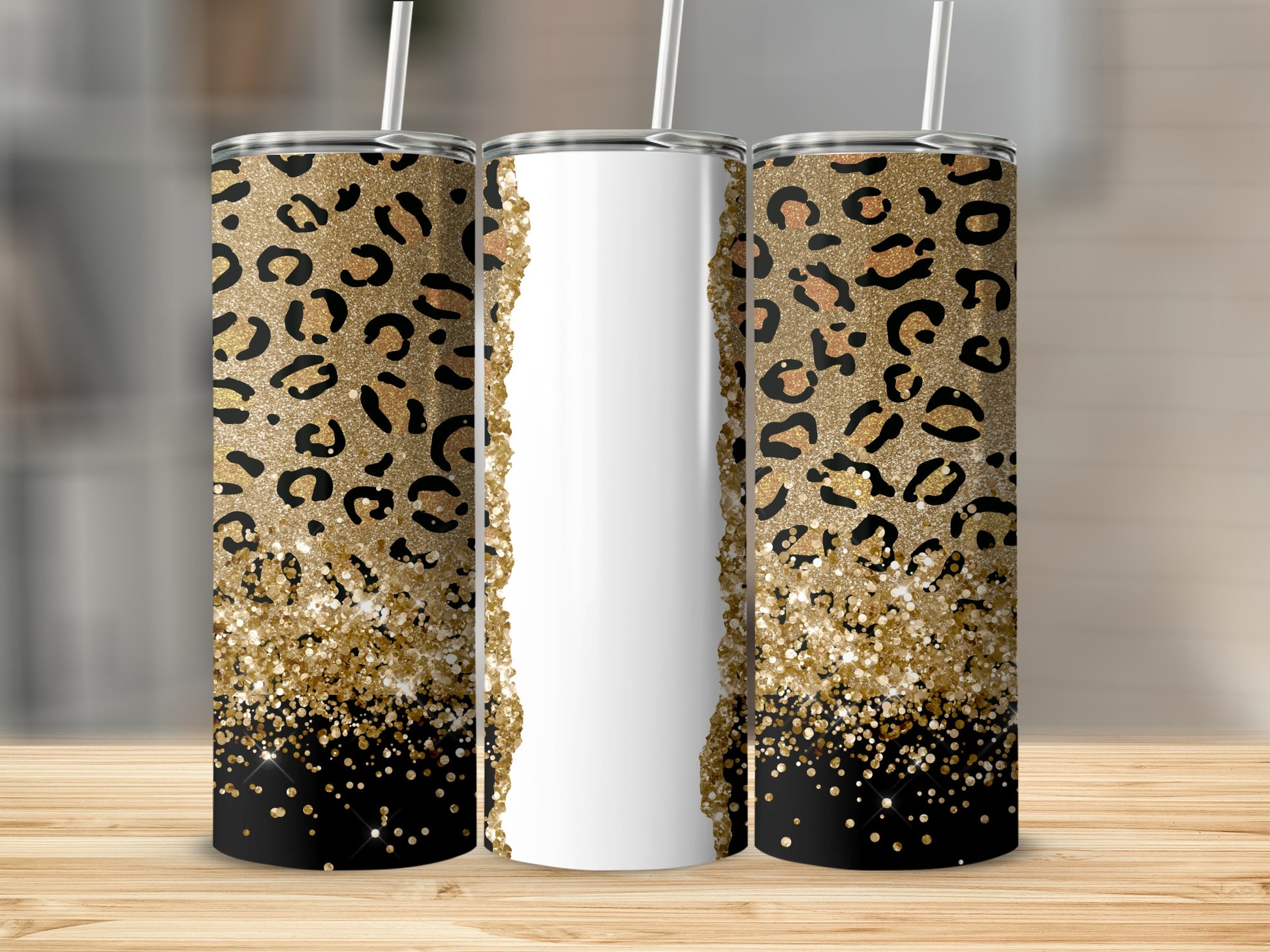Three tumblers with leopard print and gold glitter design.
